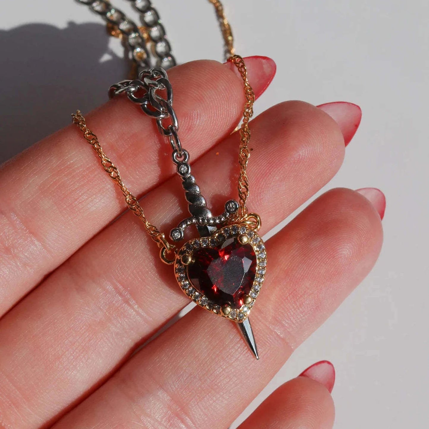 Collares de amor daga y corazón
