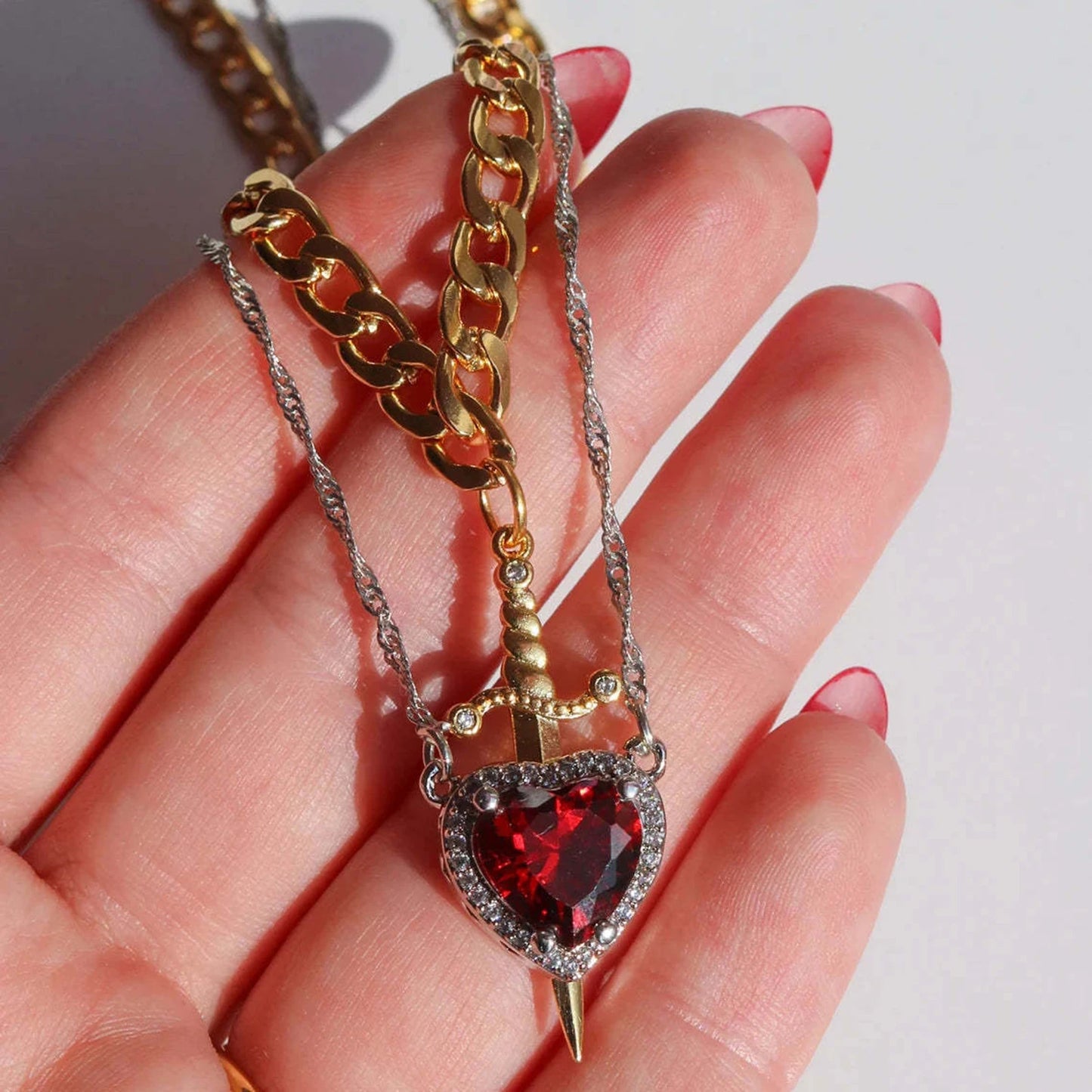 Collares de amor daga y corazón